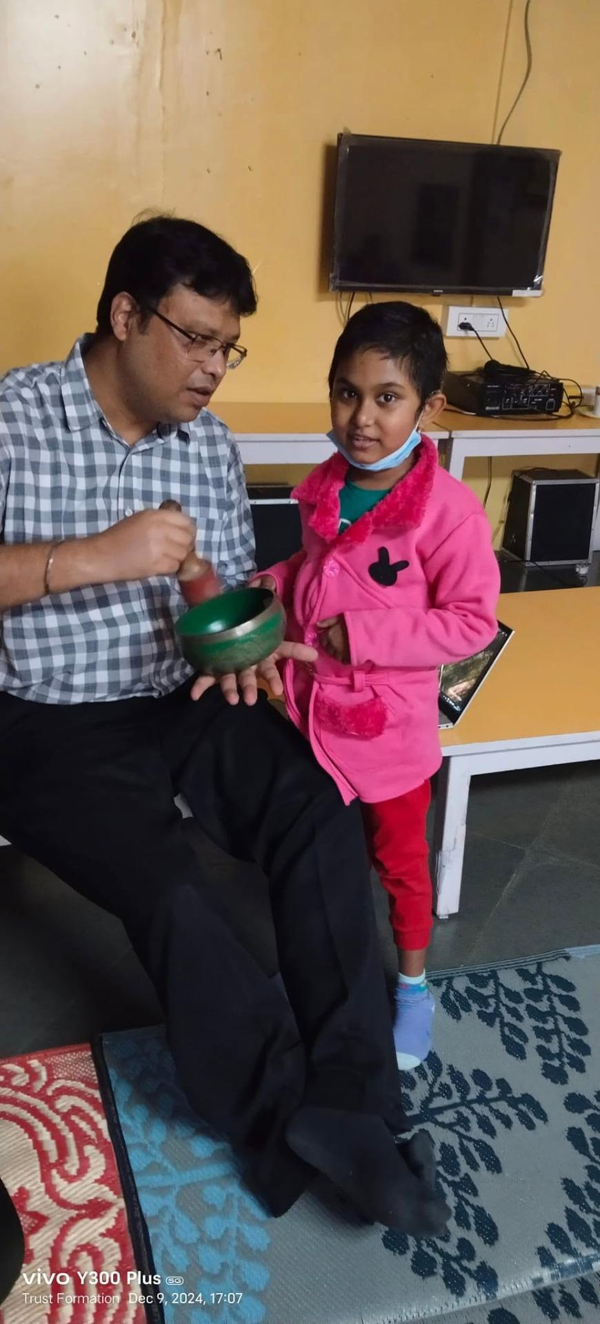 Sound-based healing session with a young cancer warrior